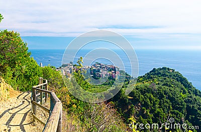 Corniglia traditional typical Italian village with colorful multicolored buildings houses on rock cliff and Genoa Gulf, Ligurian S Stock Photo