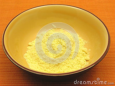 Cornmeal in a bowl of ceramic Stock Photo