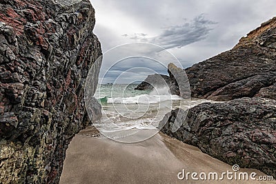 Cornwall beach and waves at Kynance cove Stock Photo