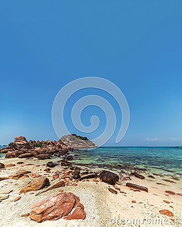 Corol reef rock landscape with a pure blue sky and a green clear water Stock Photo