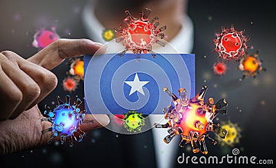 Corona Virus Around Somalia Flag. Concept Pandemic Outbreak in Country Stock Photo