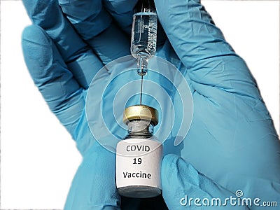 Corona virus protection. Doctor holds in hand syringe and vial with vaccine for coronavirus cure Stock Photo