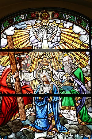 Coronation of the Virgin Mary, stained glass window in the church of Assumption in Stenjevec, Zagreb, Croatia Stock Photo