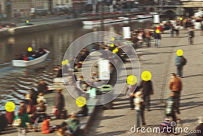 Coronavirus contact tracing, exposure detection app concept. Infected people in the crowd marked with yellow circles Stock Photo