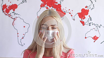 Coronavirus or covid-19 with Caucasian woman wearing face mask and pandemic on world map. stock video footage Coronavirus or covid-19 with Caucasian woman wearing face mask and pandemic on world map. stock video footage
