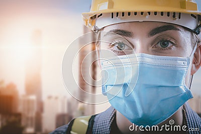 Coronavirus Covid-19 Health Protective of New Normal, Portrait Attractive of Engineer Woman in Safety Equipment on City Stock Photo