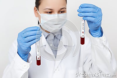 Coronavirus COVID 19 nCov Outbreak. medical or scientific holding Corona Virus Blood Test Tube from Patient. Positive Case of Stock Photo