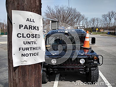 Coronavirus COVID-19 Outbreak Restrictions, All Parks Closed Until Further Notice, Police Vehicle, Rutherford, NJ, USA Editorial Stock Photo