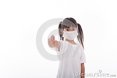 Coronavirus Covid-19.Stay at home Stay safe concept.Little girl wearing mask for protect.show stop hands gesture Stock Photo