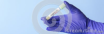 Coronavirus lab testing concept test tube in hand Stock Photo