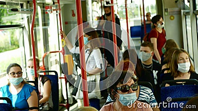 PRAGUE, CZECH REPUBLIC, JUNE 22, 2020: Coronavirus mask face tram streetcar drive crowd people passengers, public Editorial Stock Photo