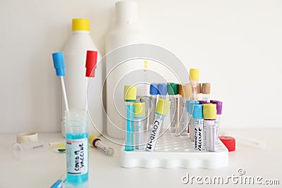 Coronavirus medical biotechnology laboratory study - test tubes with various liquids Stock Photo