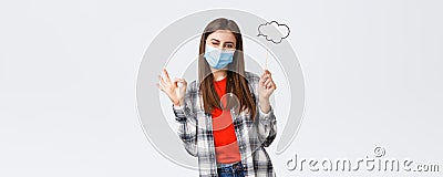 Coronavirus outbreak, leisure on quarantine, social distancing and emotions concept. No problem, girl have good idea Stock Photo