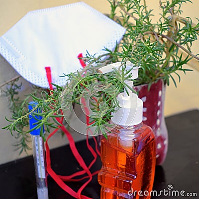 Coronavirus prevention. Hand sanitizer gel, protective mask and pills, Hand sanitizer gel, protective mask and pills Editorial Stock Photo