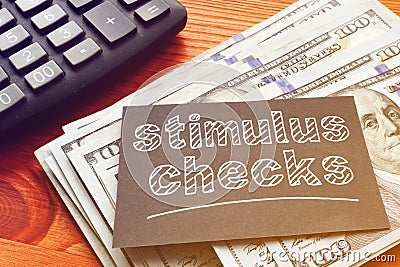 Coronavirus stimulus checks are shown on the photo Stock Photo