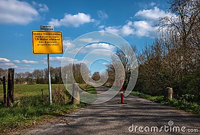Coronavirus warning sign in nature in The Netherlands. Editorial Stock Photo