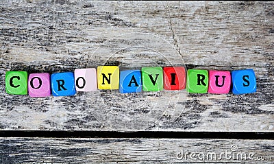 Coronavirus word on a wooden table Stock Photo