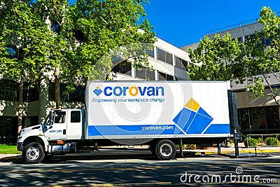 Corovan logo, sign on truck at commercial office building. Corovan is a full-service full-service commercial moving company. - San Editorial Stock Photo