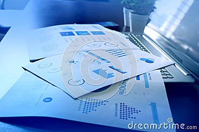 Corporate Business infograph checking sheet along with Laptop, Checking The Company Profit, Marketing Stock Photo