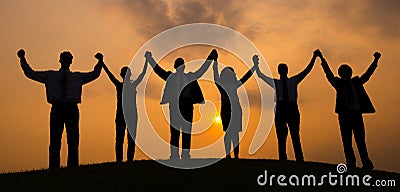Corporate business workers sunset silhouette Stock Photo