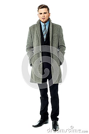 Corporate guy wearing long overcoat Stock Photo