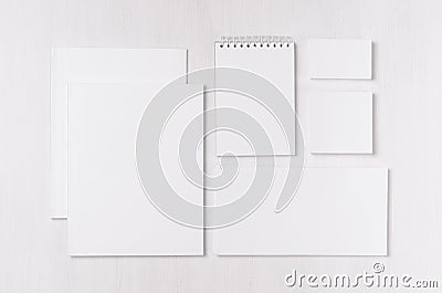 Corporate identity template with black white paper stationery set on soft white elegance wood board. Stock Photo