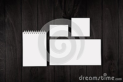 Corporate identity template, stationery on black stylish wood background. Mock up for branding, graphic designers presentations an Stock Photo