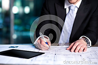 Corporate man reviewing his project plan Stock Photo