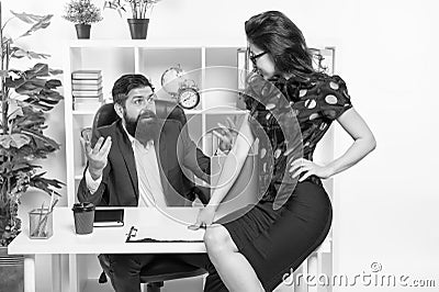 Corporate secretary. Secretary sit at managers desktop. Sexy secretary and director. Company owner and office secretary Stock Photo