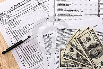 Corporate tax return form - 1120 and w 4 Stock Photo