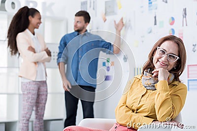 Corporate trainer and two trainees Stock Photo