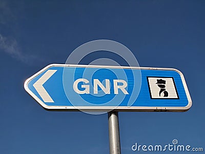 GNR police direction sign in front of blue sky in Portugal Editorial Stock Photo