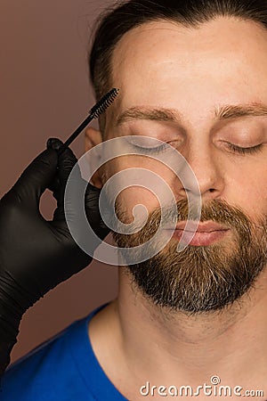 Correction shape of man eyebrow Stock Photo