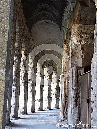 Corridor with arches of the amphitheater Marcellus to Rome in Italy. Stock Photo
