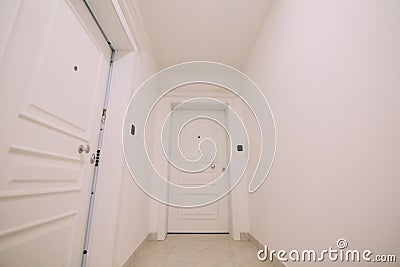 Corridor in a building. White staircase. Interior hallway with d Stock Photo