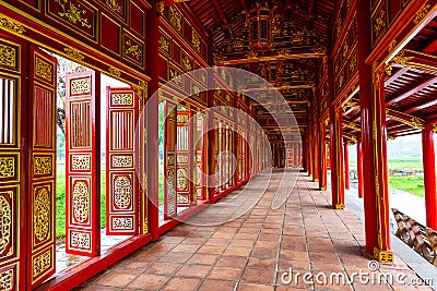 Corridor and red doors in the Forbidden Purple City of The Imperial City of Hue, Vietnam Stock Photo