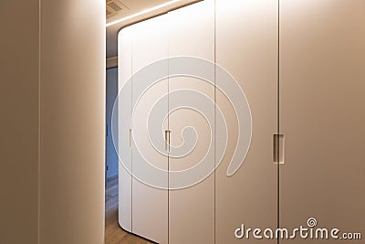 Corridor with white wardrobe. Interior of modern apartment Stock Photo