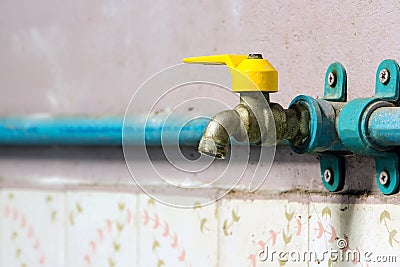 Corrode brass faucet is turned off. Stock Photo