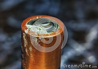 Corroded battery on dark background Stock Photo