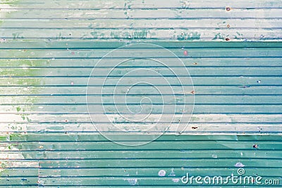 Corrugated Galvanized steel green color iron metal sheet with rusty surface for texture and background Stock Photo