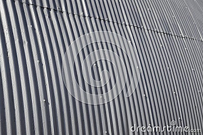 Corrugated galvanized steel panels on the exterior of a building. For background, wallpaper or clipping mask Stock Photo