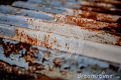 Corrugated metal with patina of brown, rust, blue, and white Stock Photo