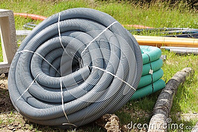 Corrugated plastic pipes used for underground electrical lines Stock Photo