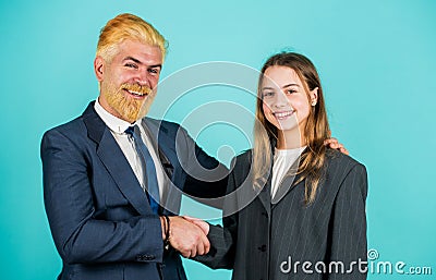 Corruption. modern office life. businessman dyed blond hair. small girl in oversized suit jacket. future career. family Stock Photo