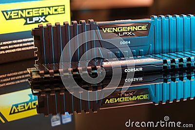 Corsair DDR4 dual kit RAM, model Vengeance LPX, 32 GB, 3200 MHz, CL 16, on reflective surface with blue light from the side Editorial Stock Photo