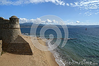 Saint-FranÃ§ois beach and Ajaccio fortress in Corsica in summer Stock Photo