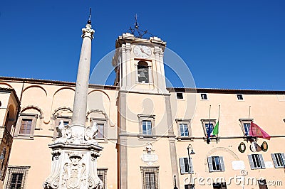 Corso Vittorio Emanuele and the palaces of the city municipality in the medieval town of Tarquinia in Italy Editorial Stock Photo