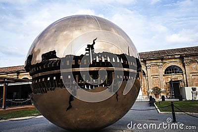 Cortile della Pigna. Sphere within a sphere by Pomodoro 1990 in the Gardens of the Vatican Museums in Rome Italy Editorial Stock Photo