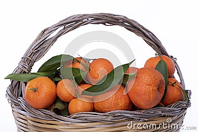 Cose up clementines on wicker basket Stock Photo