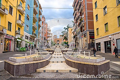 Cosenza, Italy - May 7, 2018: View of modern stairs street via Arabia with fountains, multicolored buildings Editorial Stock Photo